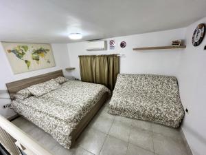 Ένα ή περισσότερα κρεβάτια σε δωμάτιο στο Modern Apartment in Napoli, Balcony