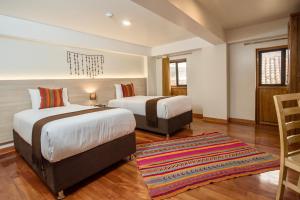 Cama ou camas em um quarto em Casa Matara Boutique