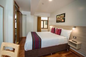 Cama ou camas em um quarto em Casa Matara Boutique