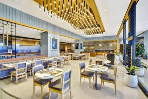 Veitingastaður eða matsölustaður á Radisson Hotel Nathdwara