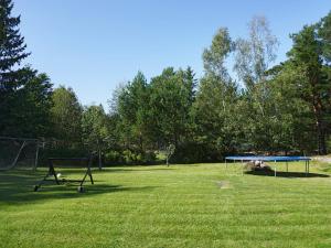 a field with two trays and a goal at 7 person holiday home in DJURHAMN in Djurhamn