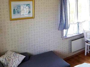 Llit o llits en una habitació de 4 person holiday home in KRISTIANSTAD