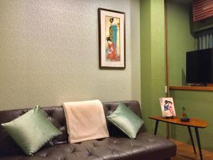Televisyen dan/atau pusat hiburan di Yumeji Guest House