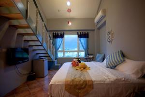 Postel nebo postele na pokoji v ubytování Cloudenjoy B&B