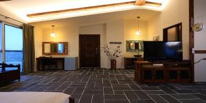 TV a/nebo společenská místnost v ubytování Cloudenjoy B&B