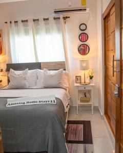Postel nebo postele na pokoji v ubytování Self-checking-Fast internet-Alexa-Smart-Tv-AC-Hot Water