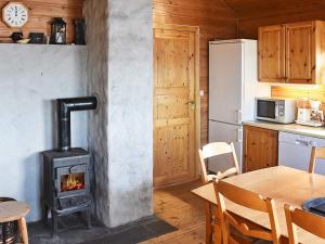 A kitchen or kitchenette at Holiday home bud VI