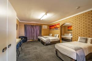 Carnarvon Motel客房内的一张或多张床位