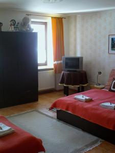 Postel nebo postele na pokoji v ubytování La Ferme de Sissi