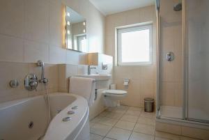 O baie la Haus-Ostseeapartments-am-Fehmarnsund-Wohnung-19-Seaside