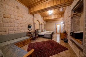 TV a/nebo společenská místnost v ubytování Cratus Stone Palace