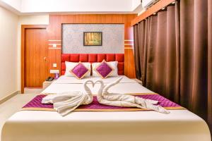 Mount Amara Hotel & Spa, Siliguri客房内的一张或多张床位