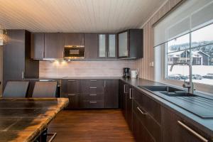 Kjøkken eller kjøkkenkrok på Trysilfjell Apartment Hotel