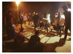 a group of people standing around in a crowd at The Link farmstay in Sa Pả