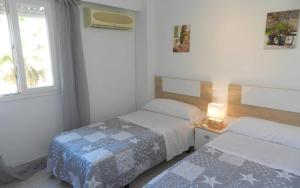 Posteľ alebo postele v izbe v ubytovaní Apartamento Talima 6 PAX + 26 fotografií