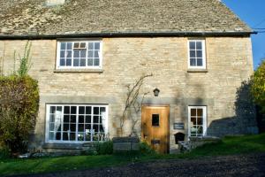 Photo de la galerie de l'établissement Charming Cottage, Great Rissington, Cotswolds, à Great Rissington