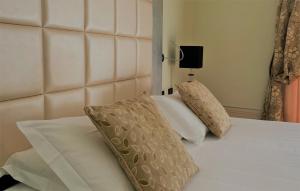 Posteľ alebo postele v izbe v ubytovaní Park Hotel Junior