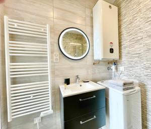 Koupelna v ubytování COLMAR - Appartements Deluxe - Lumineux - Stationnement Gratuit et Facile dans la rue