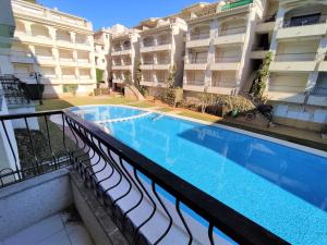 Swimmingpoolen hos eller tæt på Primera línea Playa Cargador - Playamar 1012 ALBERT VILLAS