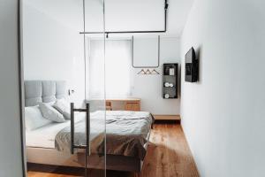 Tempat tidur dalam kamar di Quartier am Bauernstadl