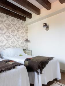 Ένα ή περισσότερα κρεβάτια σε δωμάτιο στο Hotel Real Cambados