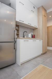 Kuchyňa alebo kuchynka v ubytovaní Urban Jungle Apartment in the city center