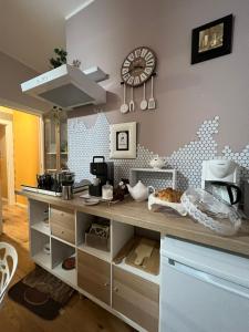 Η κουζίνα ή μικρή κουζίνα στο Cursoli Apartment