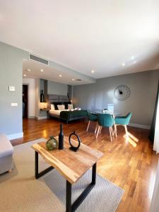 a living room with a couch and a table at Stay U-nique Apartments Passeig de Gracia II in Barcelona