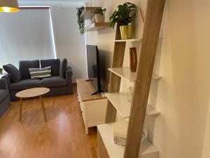 A seating area at OKTHEWAY Castelao Street