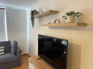 A television and/or entertainment centre at OKTHEWAY Castelao Street