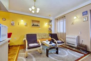 Posedenie v ubytovaní Apartment Simeone