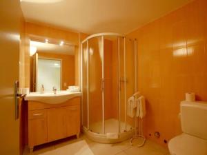 a bathroom with a shower and a sink at Depandance Garni Golf in Ascona +37 photos