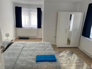 Łóżko lub łóżka w pokoju w obiekcie Center House