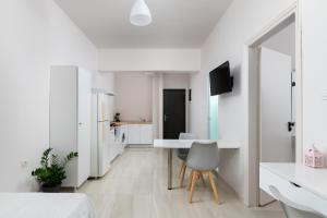 A kitchen or kitchenette at Maravelia Apartments Rhodes
