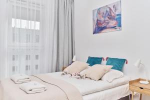 Posteľ alebo postele v izbe v ubytovaní Apartment Wichrowa with FREE GARAGE Wrocław by Noclegi Renters