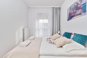 Posteľ alebo postele v izbe v ubytovaní Apartment Wichrowa with FREE GARAGE Wrocław by Noclegi Renters