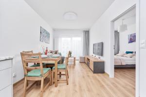 Posteľ alebo postele v izbe v ubytovaní Apartment Wichrowa with FREE GARAGE Wrocław by Noclegi Renters
