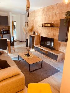 Posezení v ubytování Masha Apartment + 37 fotografií