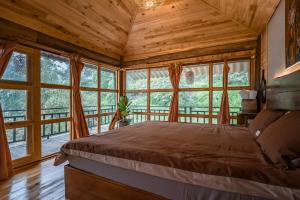 Postel nebo postele na pokoji v ubytování Deja Vu Sapa Homestay