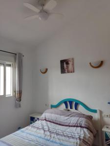 A bed or beds in a room at Casa Joleen 1 Még 37 kép