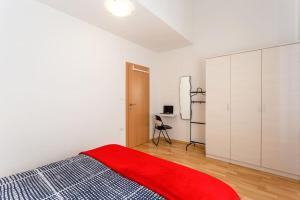 Postel nebo postele na pokoji v ubytování Apartments Punta Premantura