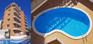a building with a swimming pool in front of a building at APCOSTAS Villa de Madrid in Blanes