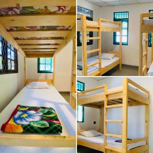 Pokój z 2 łóżkami piętrowymi w pokoju w obiekcie Kiara Sands w mieście Mirissa