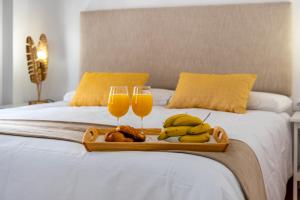 Łóżko lub łóżka w pokoju w obiekcie Historic City Centre - PREMIUM