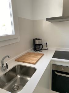 Kuchnia lub aneks kuchenny w obiekcie Apartamento “El Lometico”