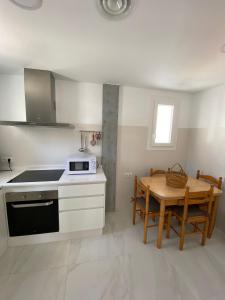 Kuchnia lub aneks kuchenny w obiekcie Apartamento “El Lometico”