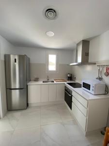 Kuchnia lub aneks kuchenny w obiekcie Apartamento “El Lometico”