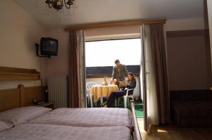 Voodi või voodid majutusasutuse Hotel Gasthof Brüggler toas