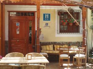 Fotografia z galérie ubytovania Hostal Restaurante La Muralla v destinácii Cañete