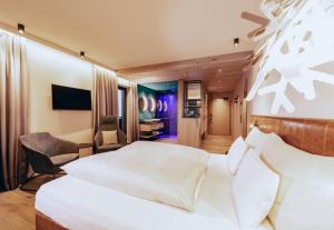 Posteľ alebo postele v izbe v ubytovaní ZillergrundRock Luxury Mountain Resort